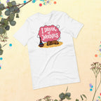 White unisex t-shirt with I Dream of Weenies text and an illustration of a sleeping dachshund puppy dreaming