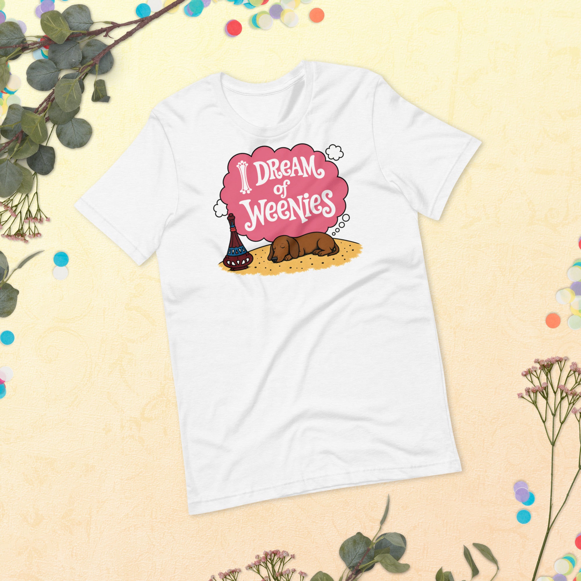 White unisex t-shirt with I Dream of Weenies text and an illustration of a sleeping dachshund puppy dreaming