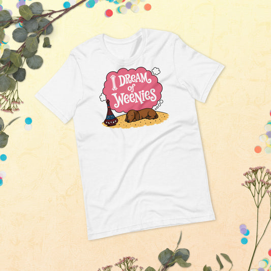 White unisex t-shirt with I Dream of Weenies text and an illustration of a sleeping dachshund puppy dreaming